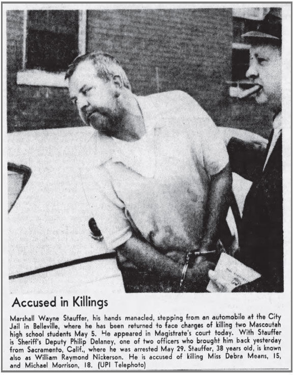 Stauffer in handcuffs
